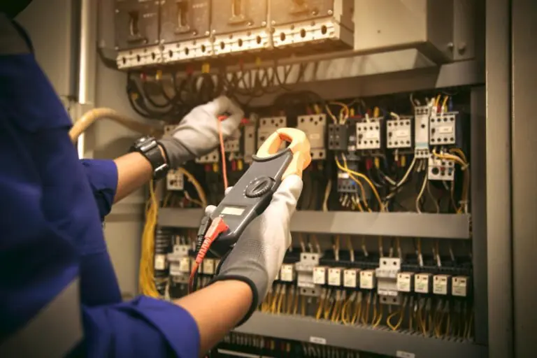 Clamp meter testing on a distribution panel